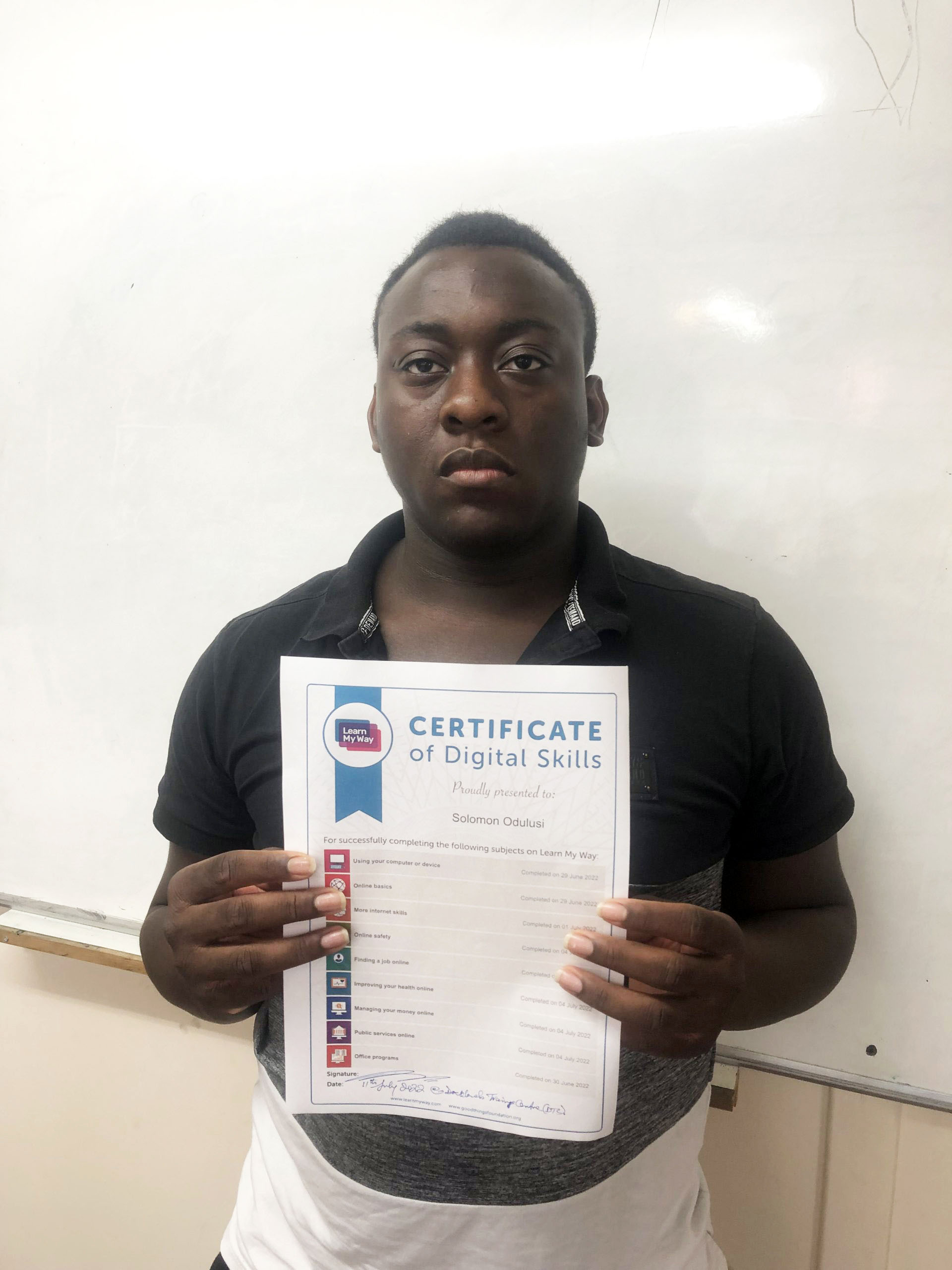 Student with learn my way certificate