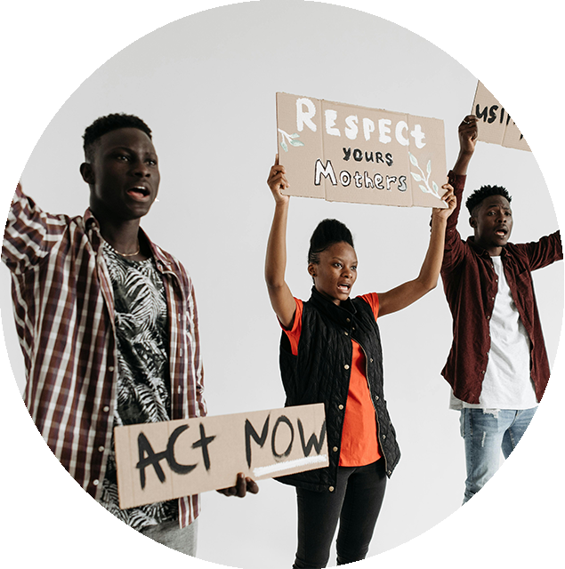 Young people holding up signs